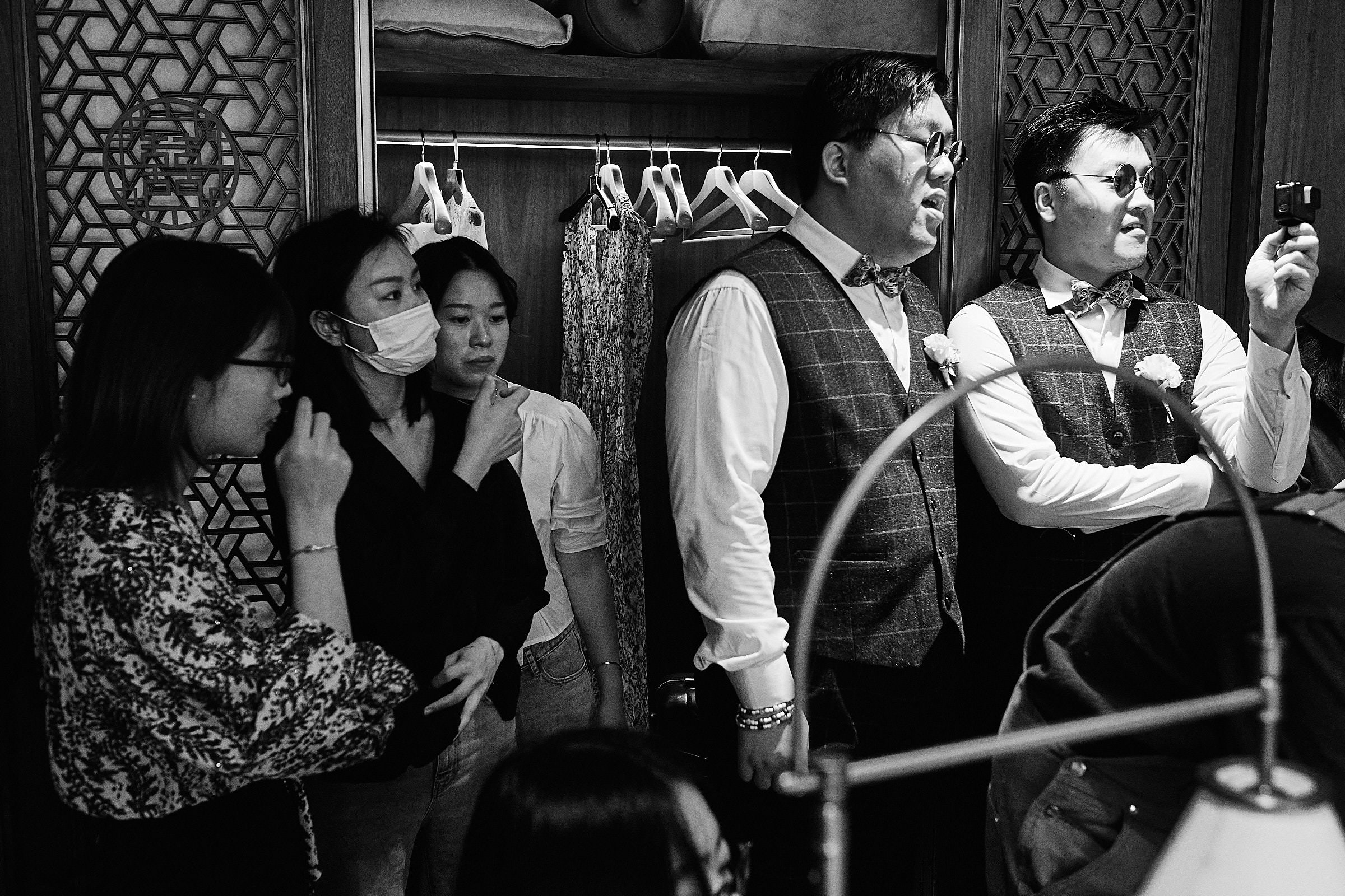 Makup Artists And Groomsmen Observe The Couple In Shanghai Wedding