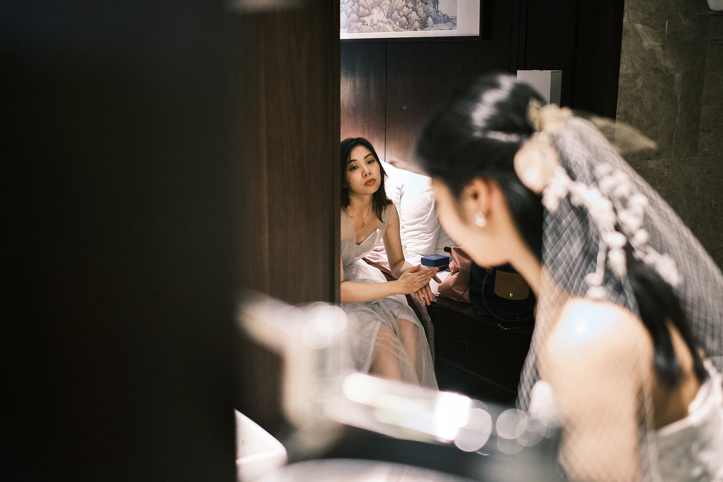 Bridesmaid Looks Towards The Bride In Hangzhou Wedding