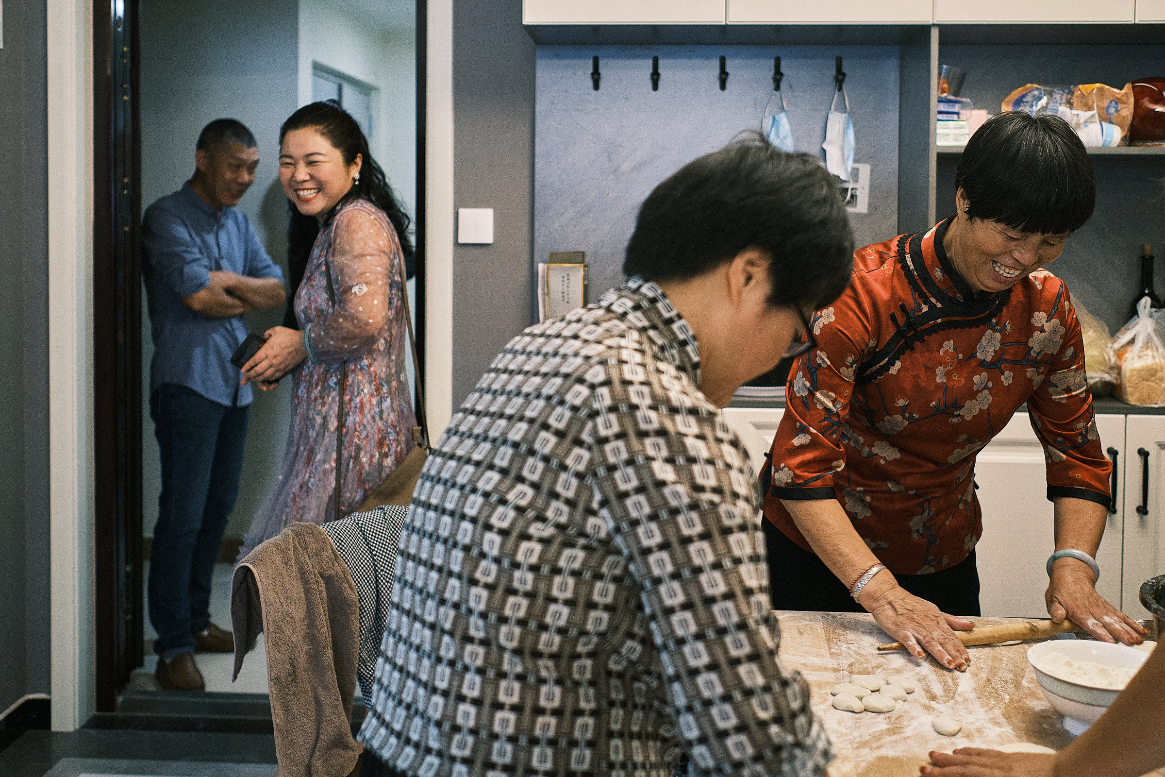 Chinese Aunts Prepare Dumplings And Another Aunt Laughs The Morning Of The Wedding