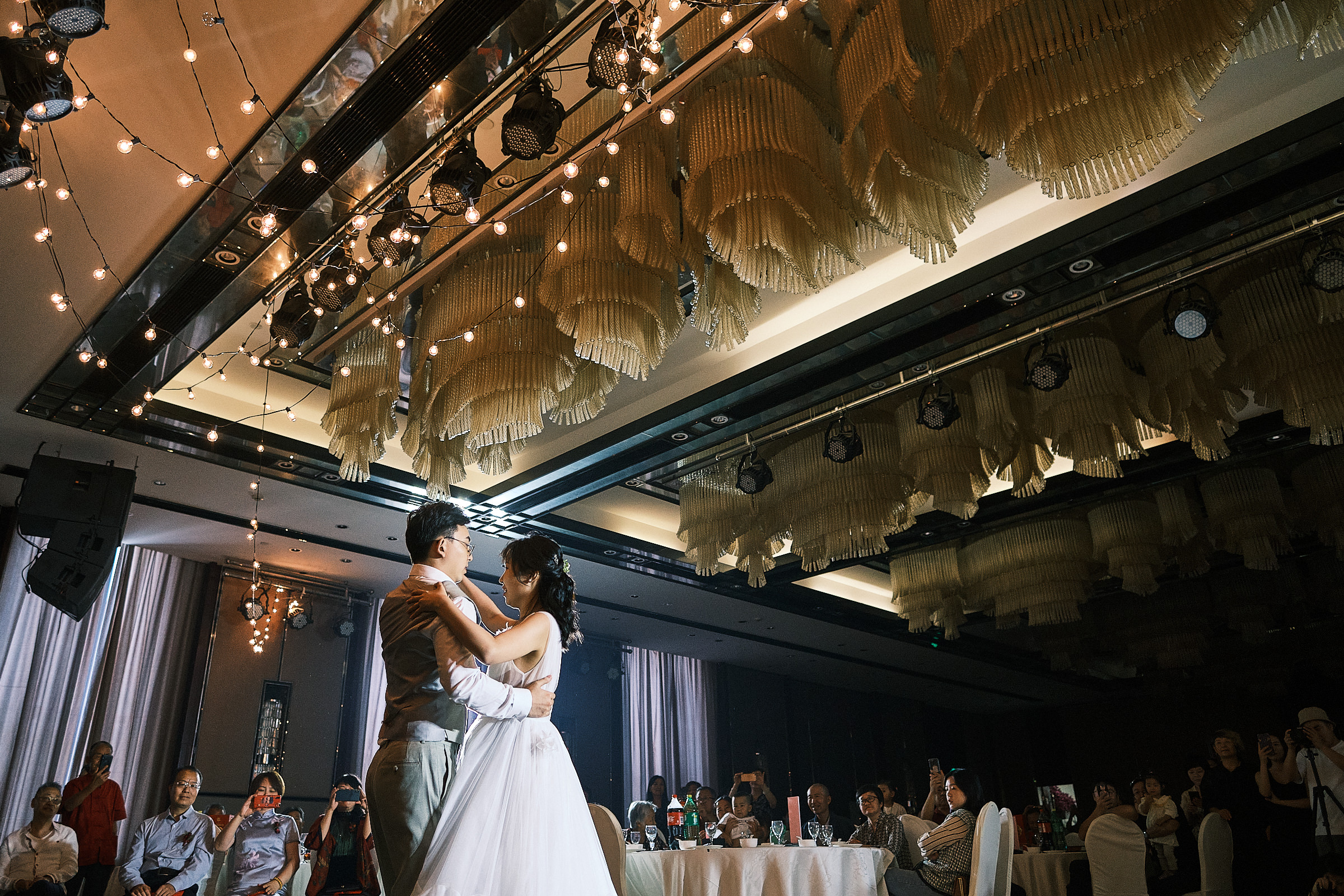 Bride And Groom Share Their First Dance At Reception Location