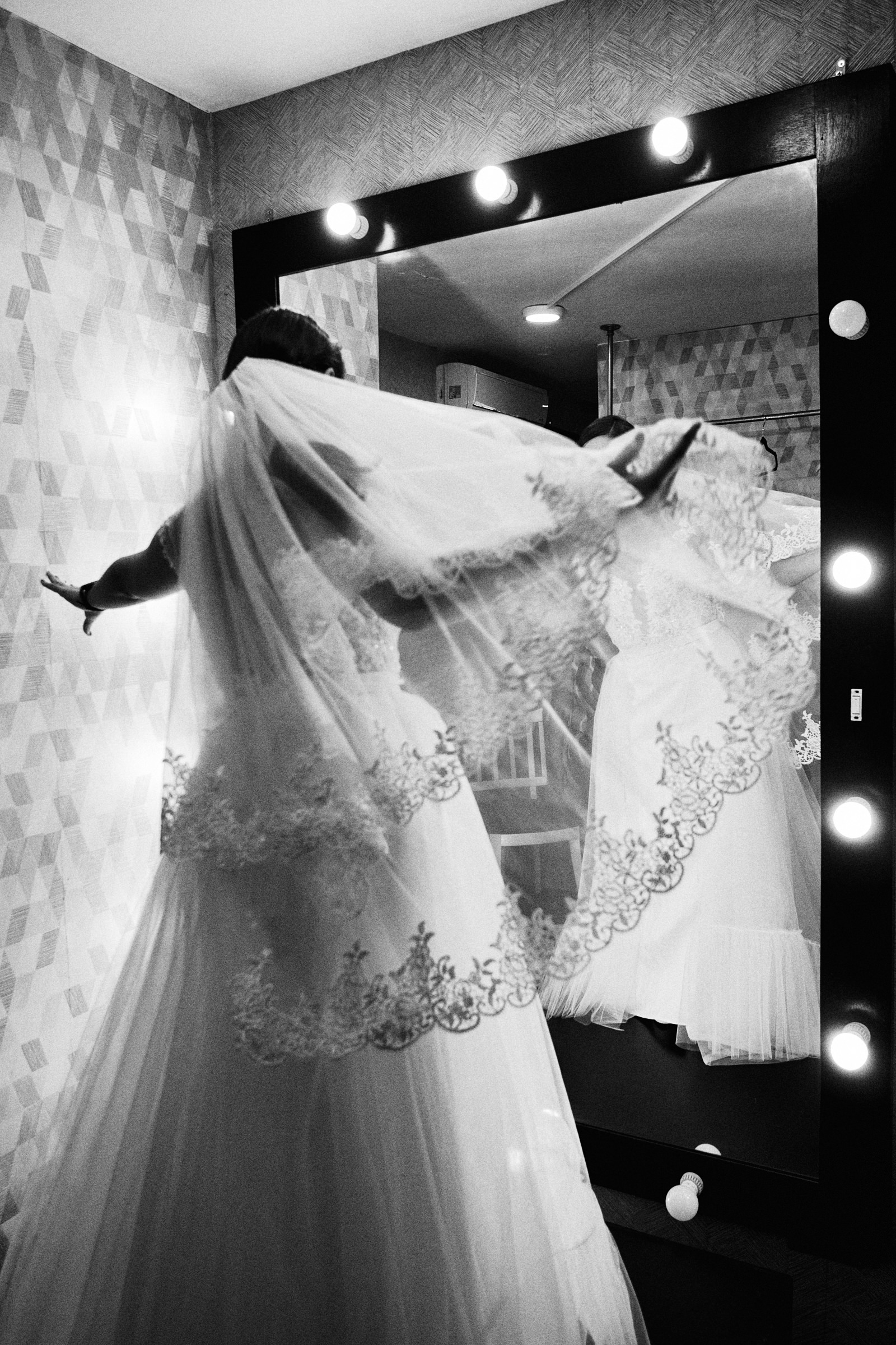 Bride Tries On Her Dress Prior To Wedding In Tampico Mexico