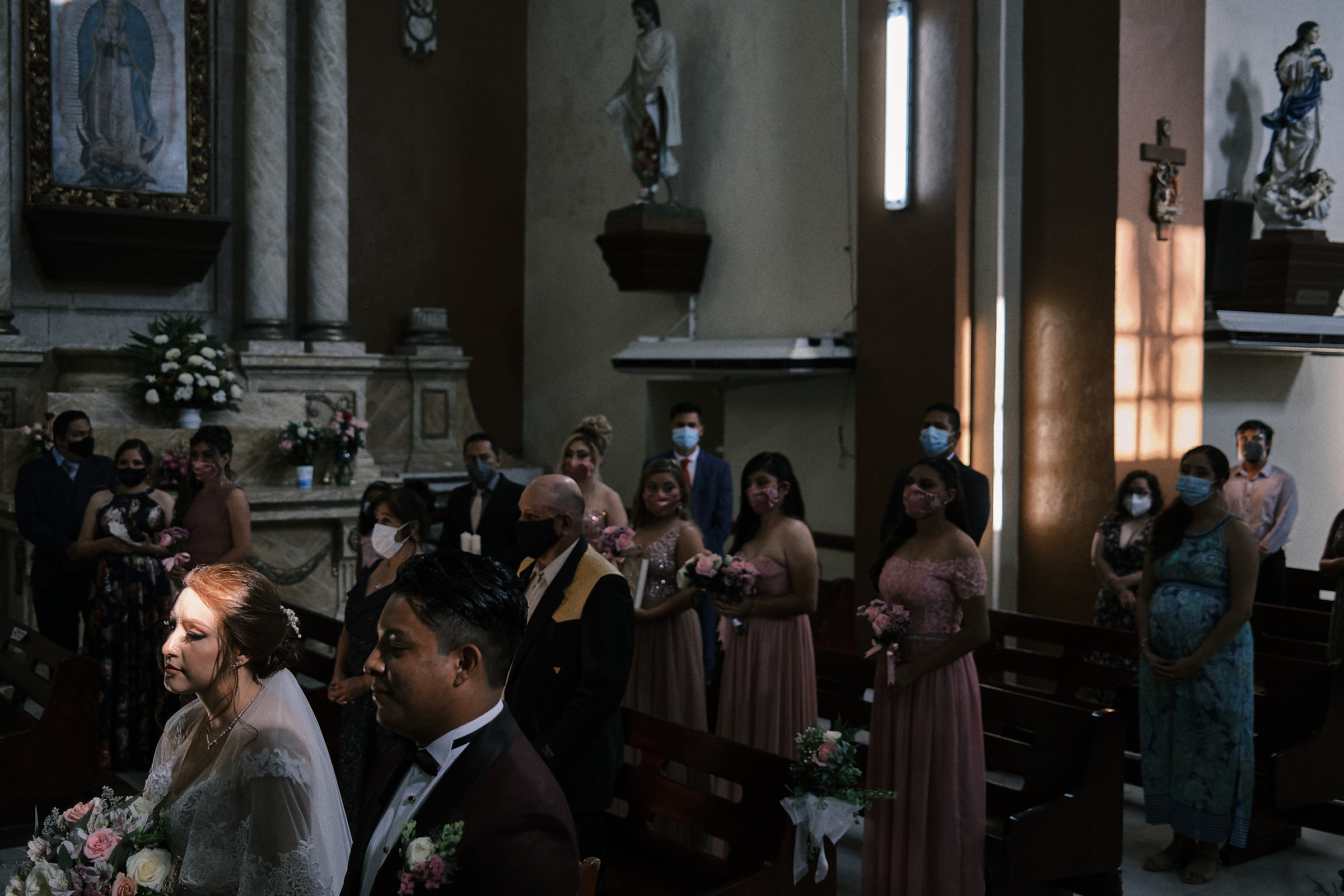 Light Enters Through A Window And Falls On Bride During Ceremony In Tampico Mexico