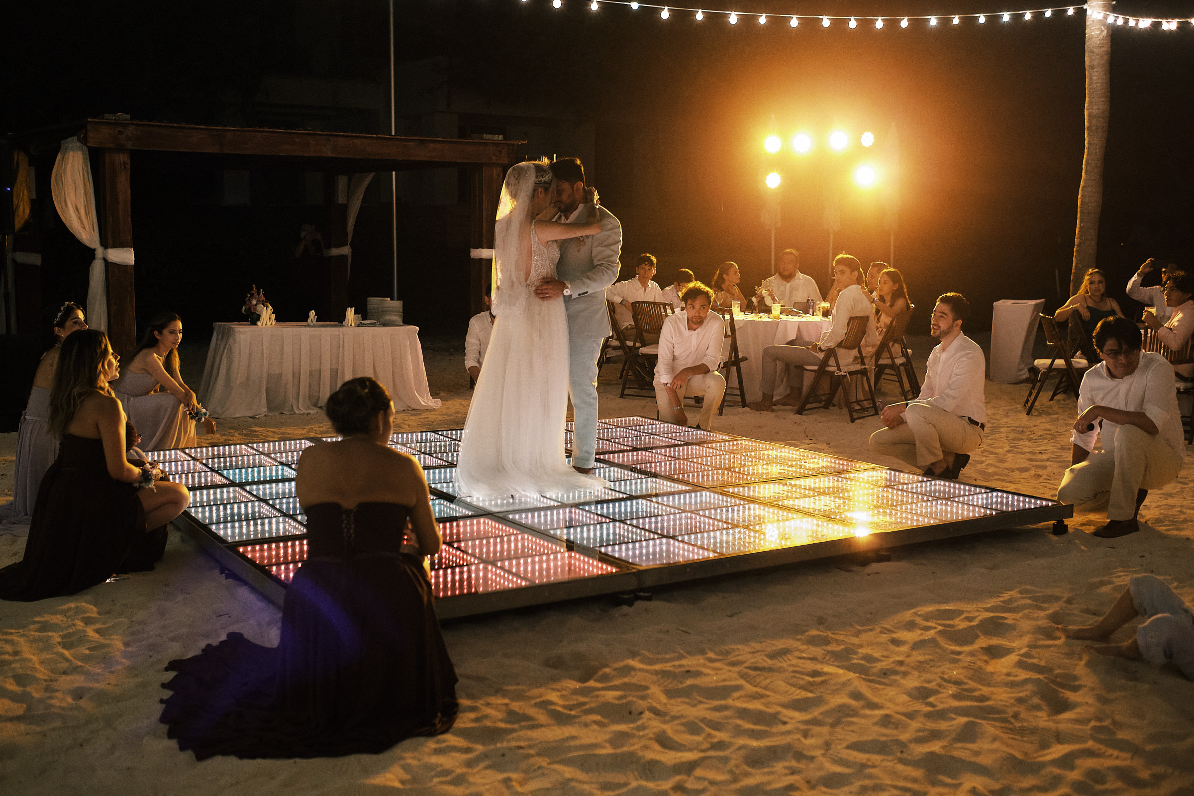 Bride And Groom Have Their First Dance On Beach Wedding