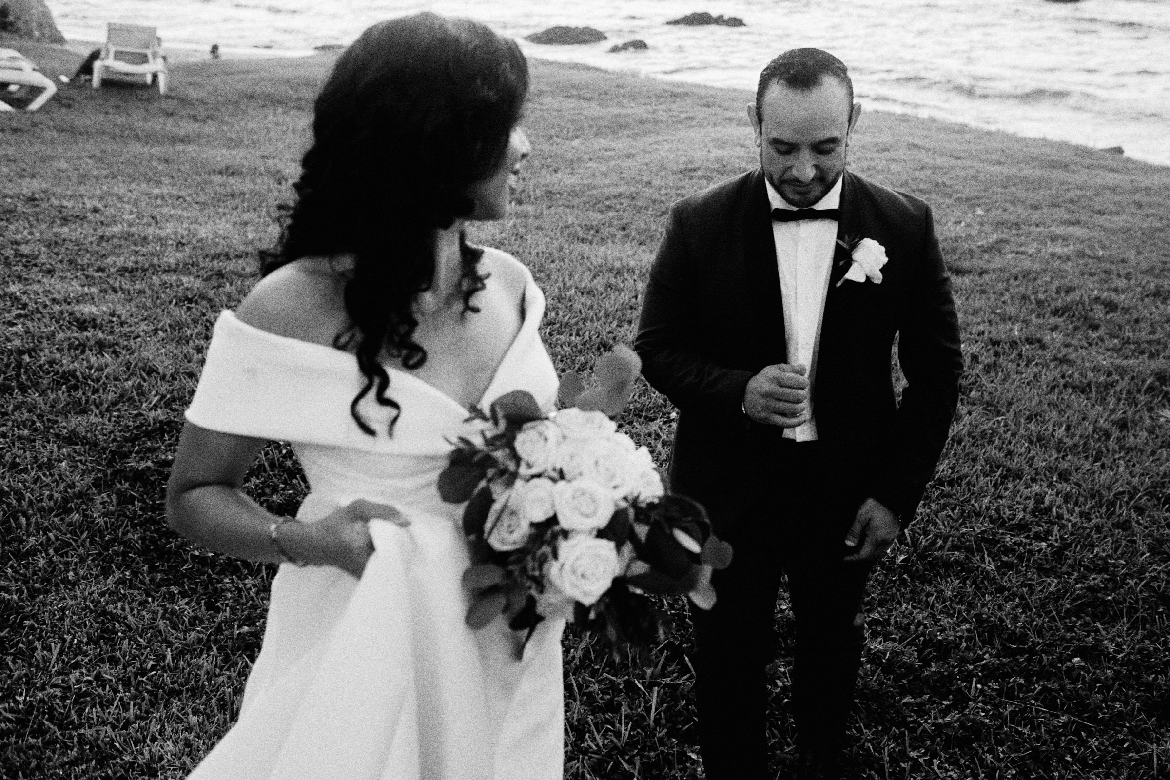 Black And White Candid Photo Of Groom And Bride