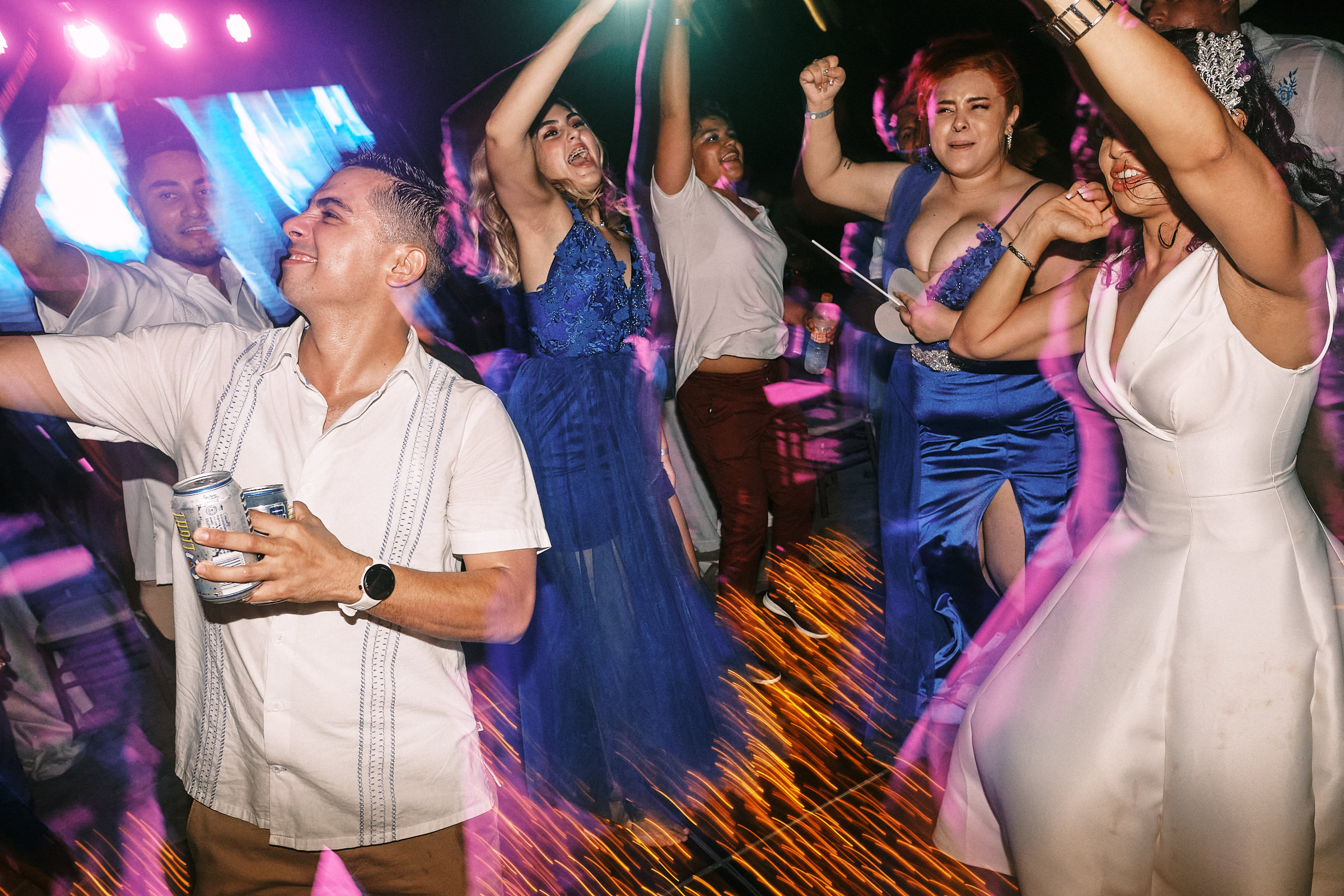 Energetic Photo Of Bride And Friends Dancing
