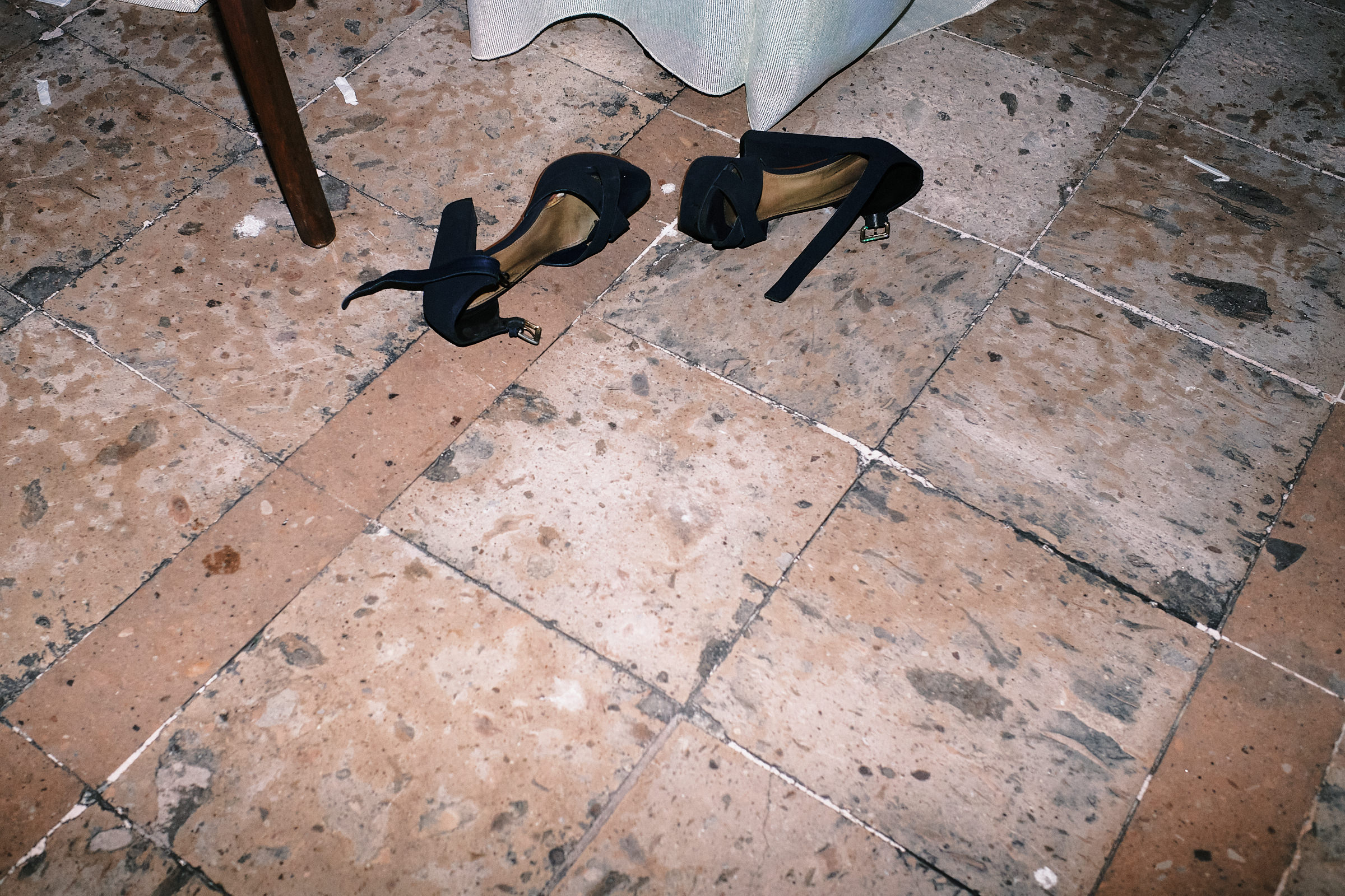Wedding Shoes Put Aside During Dancing
