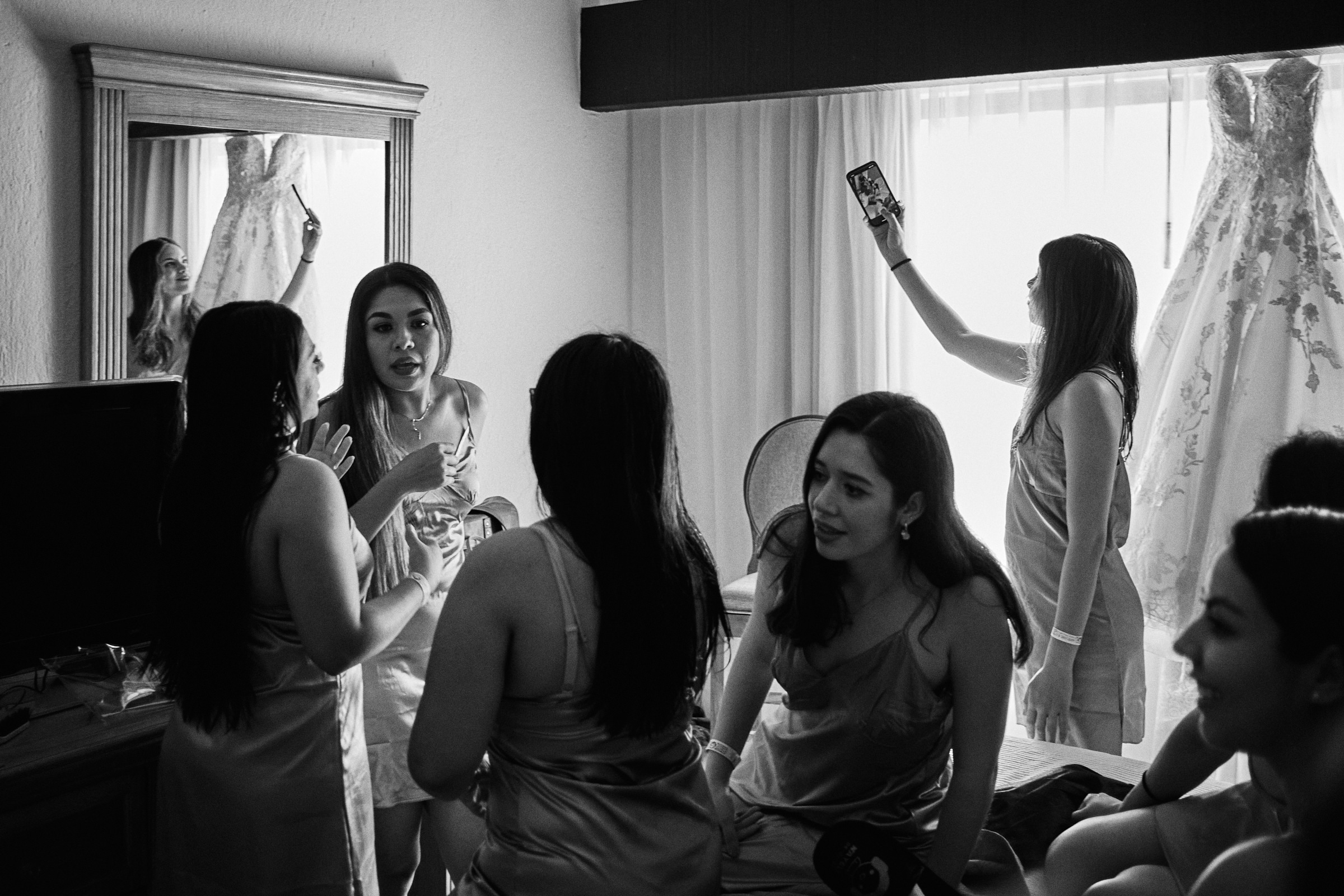 Bridesmaids Hang Out Around The Wedding Gown Morning Of The Wedding In Mexico