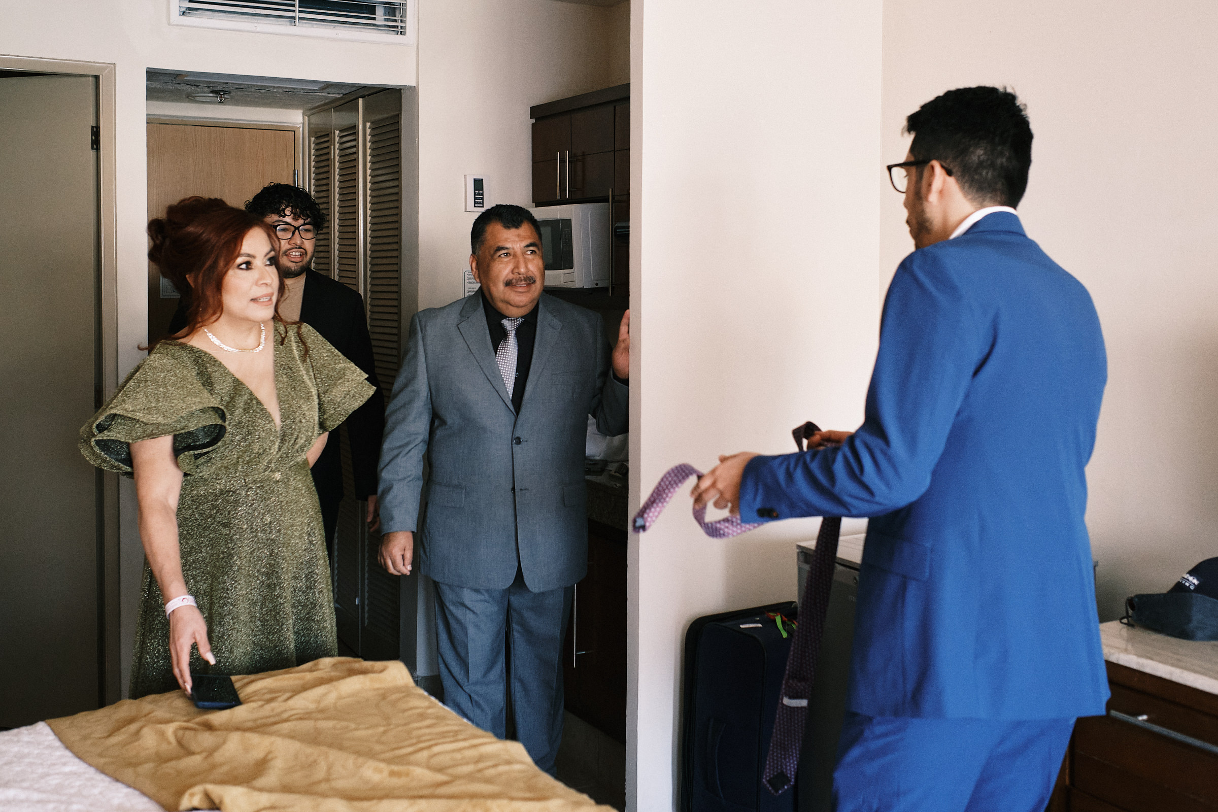 Groom Brings Tie To His Parents And Brother In Hotel Canto Del Sol
