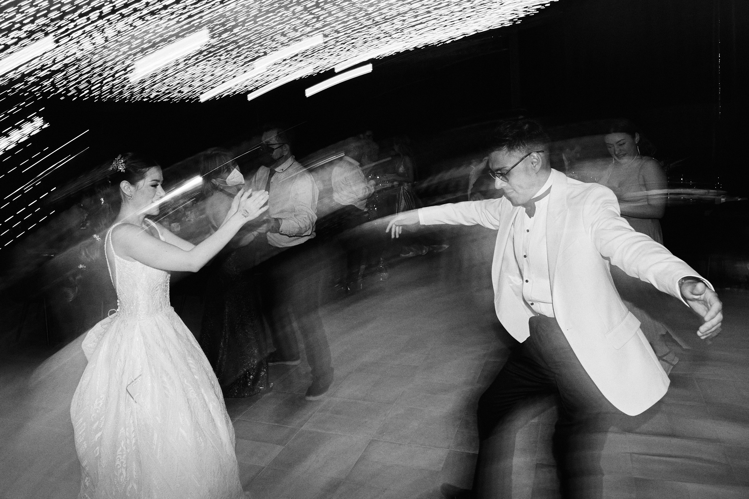 Bride And Groom Have Fun On The Dance Floor Of Their Reception In Hacienda Santo Cristo